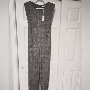JUMPSUIT WARM  GRAY COLOR SIZE XL ON BUTTON LENGTH 44 INCH.